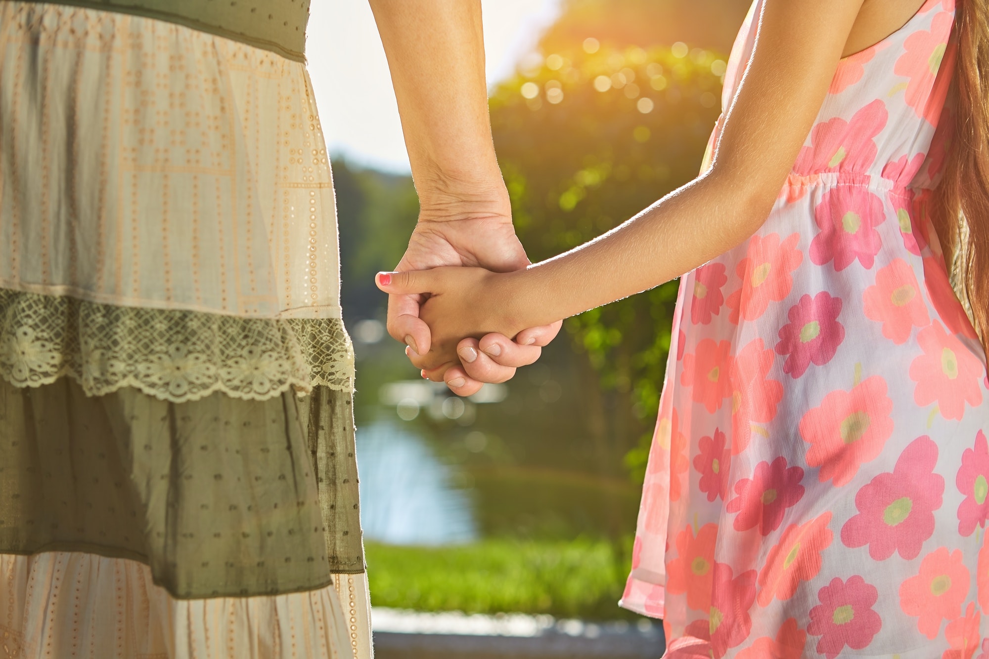 Child with grandma holding hands